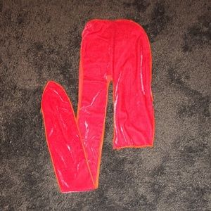 Pink velvet durag with orange stitching